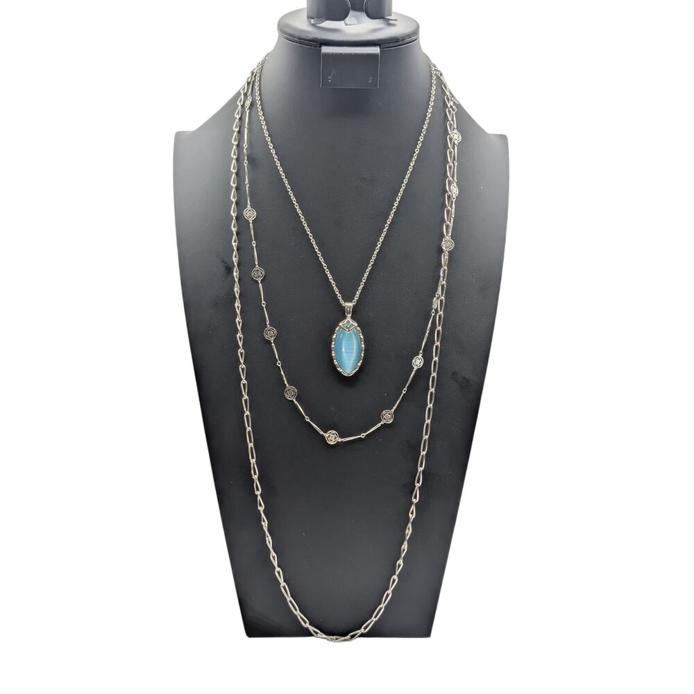 Lot of Three Silver Tone Necklaces-Blue Faux Stone Chain & Avon Vtg Lace Flower